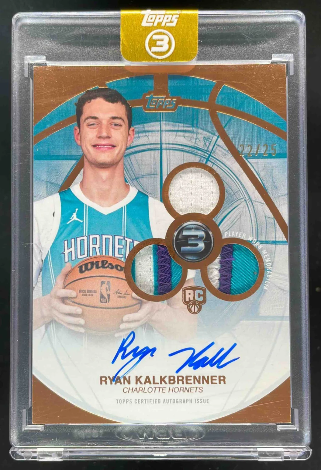 2025-26 Topps Three Rookie 3 Patch Vertical Bronze Ryan Kalkbrenner RC Auto /25