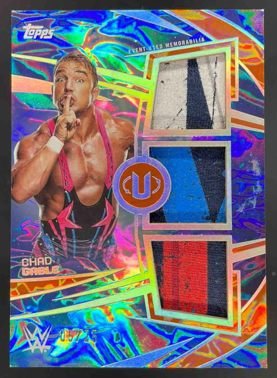 2025 Topps Universe WWE Triple Superstar Relics Orange Warp Chad Gable /25